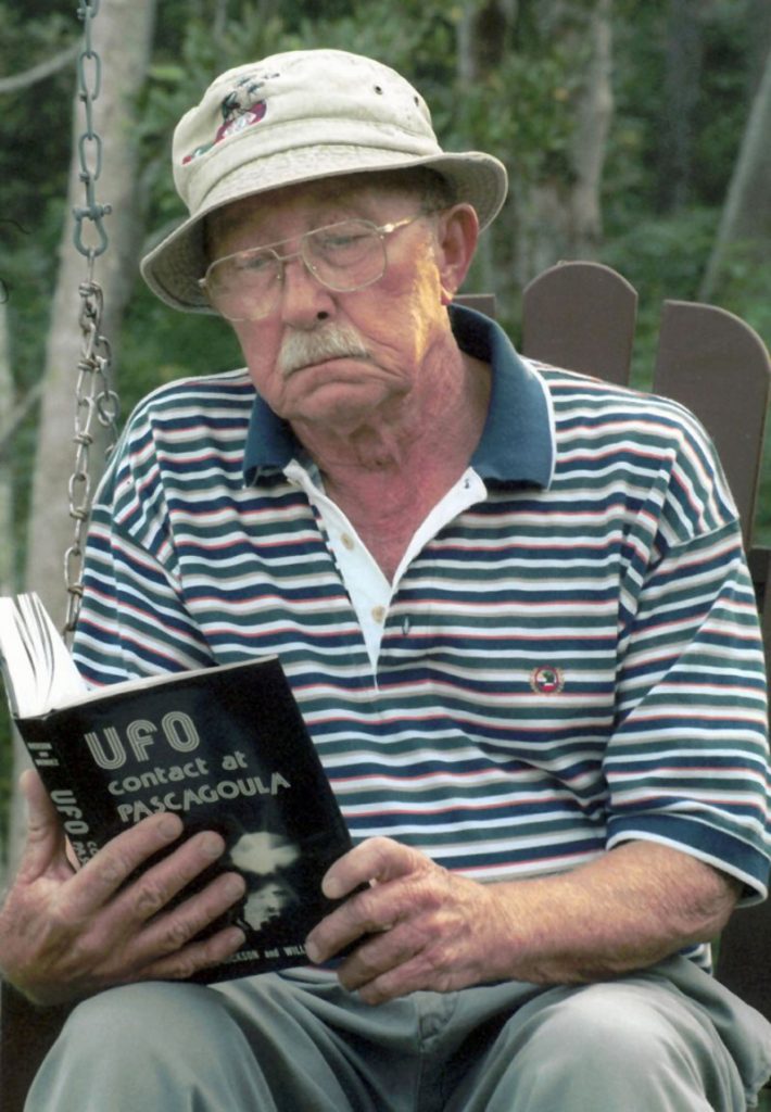 Charlie Hickson with his book UFO Contact at Pascagoula (image credit: AP Photo / Christy Jerrnigan)