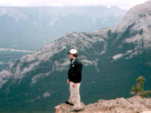 Standing on the Edge of Sulphur Mountain (2,451 m high) in Banff, Alberta